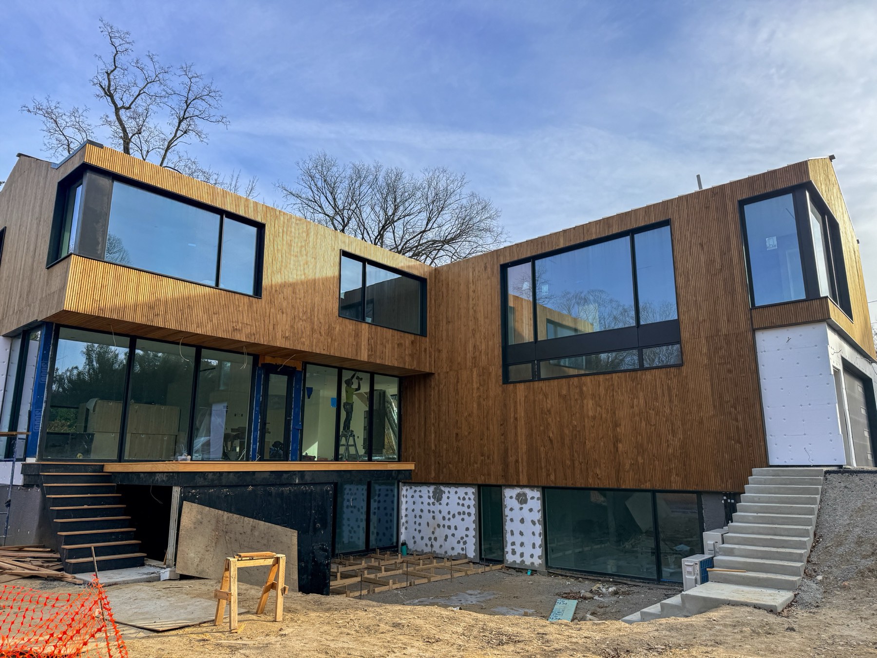 Modern new development with fluted wood cladding under construction