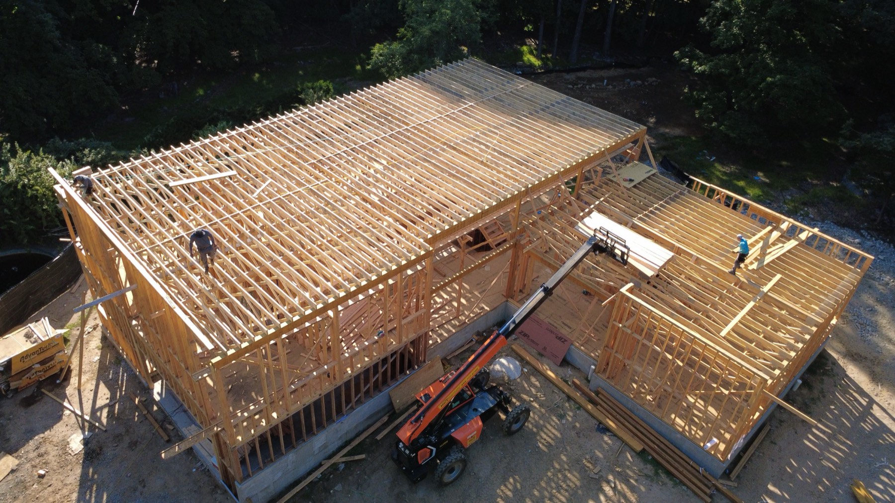 Aerial view of roof framing and truss system under construction