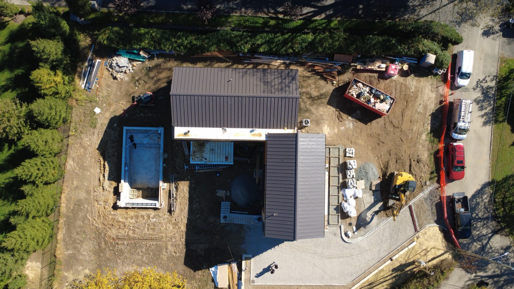 Aerial view of a completed metal roof on a new development